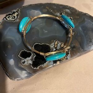 gold bangle with 3 turquoise stones